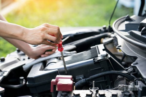 Technician check the engine daily, maintenance and repair concept